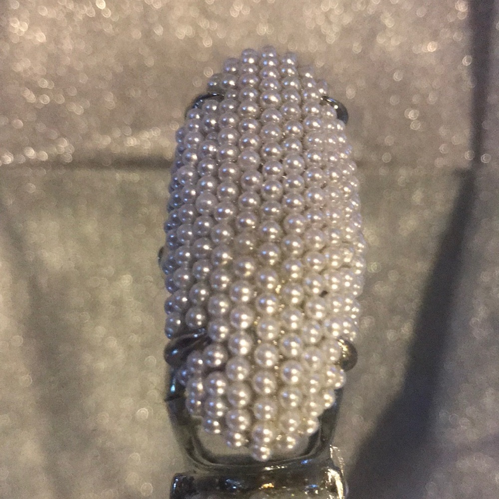 White beaded middle finger stretch Ring